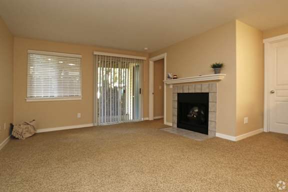 Cozy up in your spacious living room with electric fireplace! at Commons at Avalon Park Apartments, Oregon, 97224