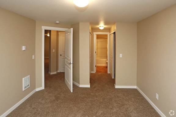 Walk through his and hers closets on the way to the master bath! at Commons at Avalon Park Apartments, Tigard, OR