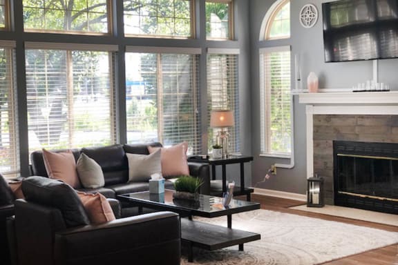Clubroom With Fireplace And TV at Eagle Crest Apartments, Galloway, OH, 43119