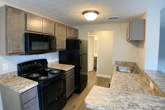 Granite Countertop Kitchen at Woodhills Apartments, West Carrollton, Ohio