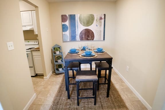 Dining table and chair near kitchen at Oakwood Apartments, Kentucky, 41042