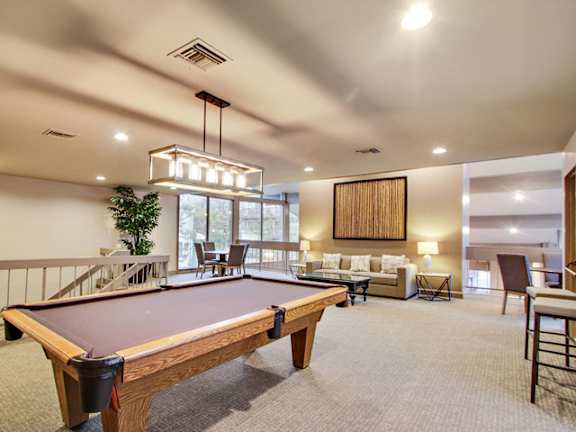 Two-story recreation room with Wi-Fi, at Woodcliff Apartments, 3201 Overland Ave, LA