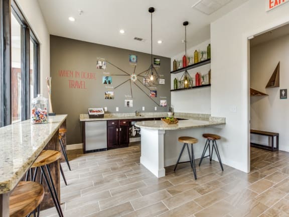 Gorgeous clubhouse with bar top seating overlooking the pool at CLEAR Property Management , The Lookout at Comanche Hill, Texas