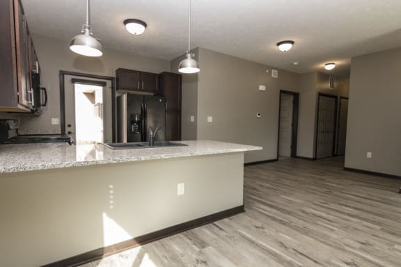 Spacious dining and living area with hardwood floors at North Pointe Villas in north Lincoln, Nebraska