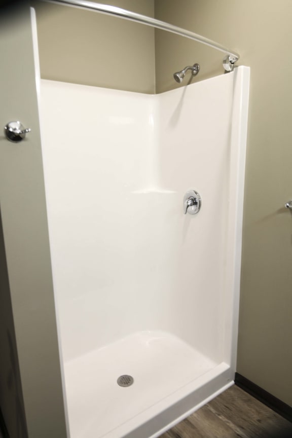 Master bathroom with shower and double sinks with granite countertops in 3 bedroom apartment for rent at North Pointe Villas best apartments Lincoln NE 68521