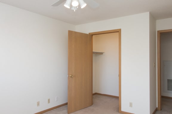 Bedroom with walk-in closet with light at Northridge Heights in north Lincoln, Nebraska 68504