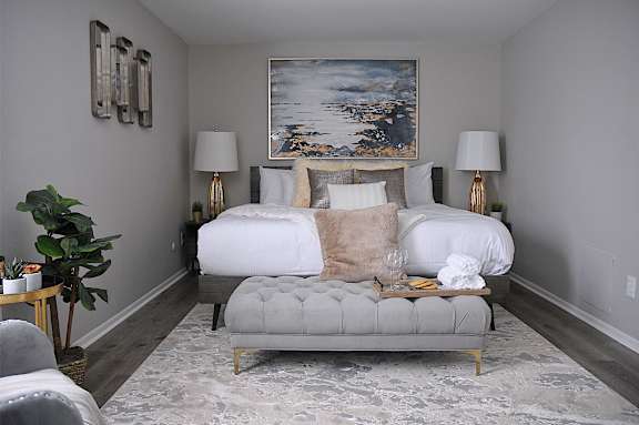 a living room with couches and a coffee table
