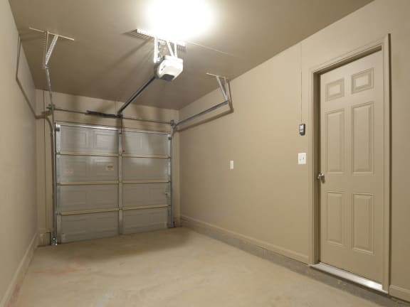 a bedroom with a closet and a door at The Pointe at Manorgreen Townhomes, Baltimore, 21220