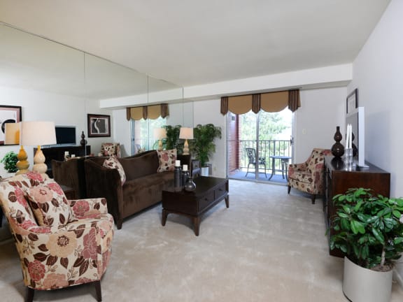 Carpeted living room  at Rockdale Gardens Apartments*, Maryland