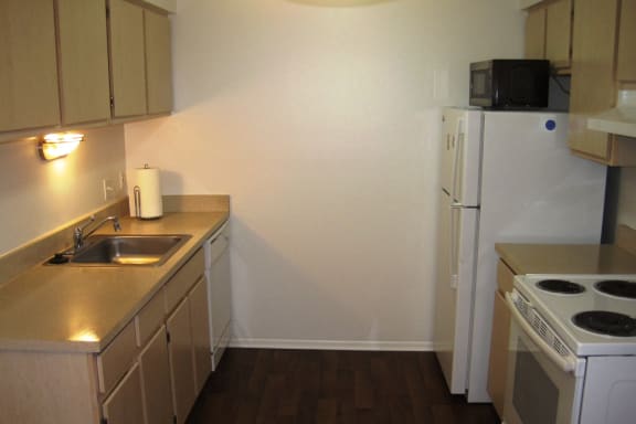 Kitchen in Short-Term Furnished Unit Available at Dover Hills Apartments in Kalamazoo, MI