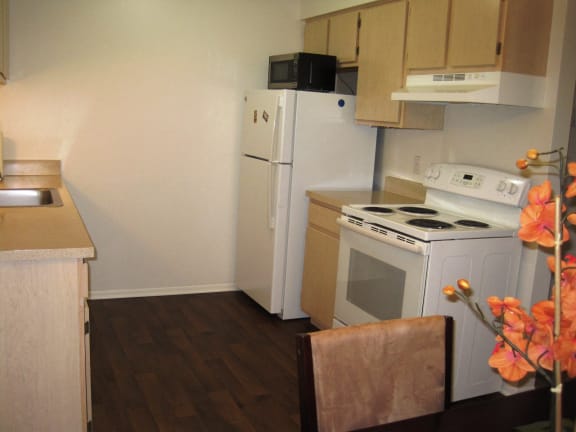 Kitchen in short-term furnished apartment available at Dover Hills Apartments in Kalamazoo, MI