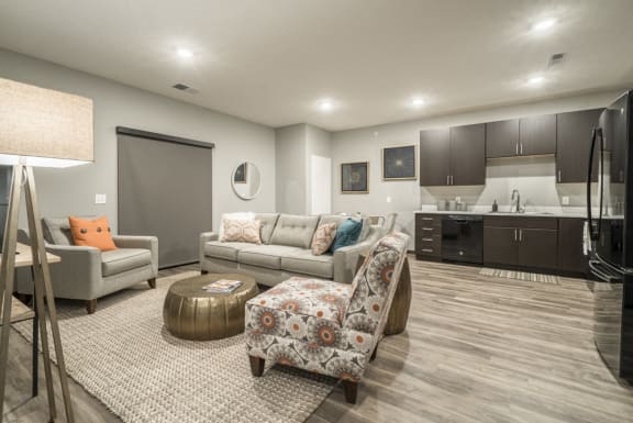 The Conrad-Traditional design scheme with dark cabinetry and light countertops