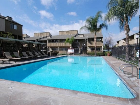 Pool With Sunning Deck at Highlander Park Apts, Riverside, California