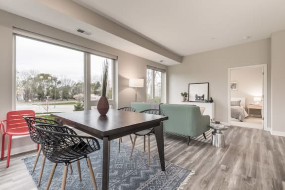Furnished living room with large windows
