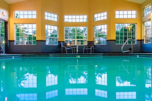 Soothing blue indoor swimming pool at Waterford Apartments, Washington, 98208
