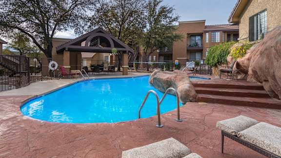 Arboretum pool view with sparkling pool and lounge area