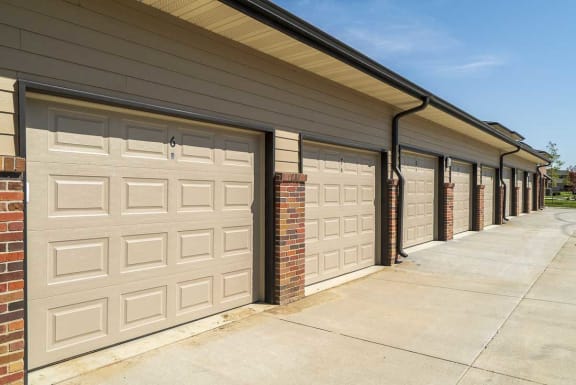 A row of garage doors are closed.