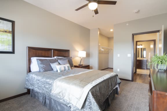 Spacious bedroom with walk in closet at 360 at Jordan West in West Des Moines, IA