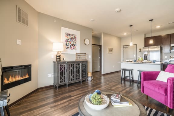 Living room with fireplace at 360 at Jordan West