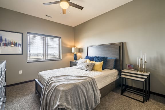 Spacious bedroom large enough for a bed and dresser at 360 at Jordan West