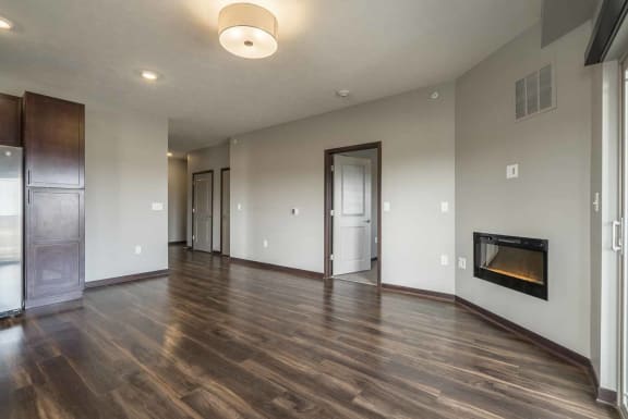 Living room space with fireplace at 360 at Jordan West