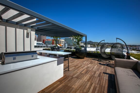 Rooftop Grilling and Relaxation Station t Legendary Glendale Apartments, California