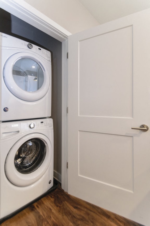 A stacked washer and dryer in a closet. at Keva Flats, Exton, Pennsylvania