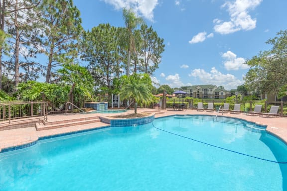 Park Del Mar Apartments resort-style pool with waterfall and spa