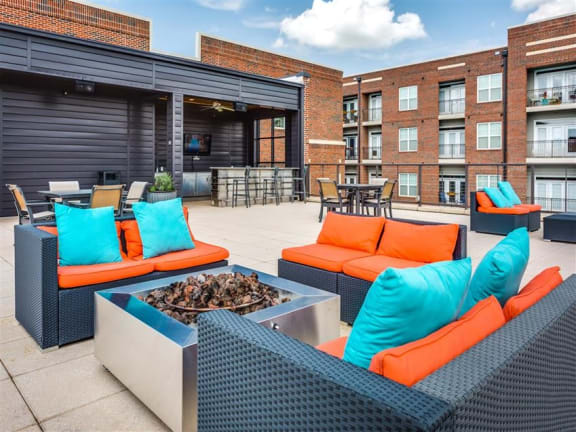 Outdoor courtyard with fire pit at Greenway at Stadium Park, Greensboro