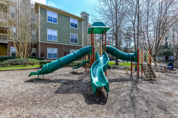 Children Play area at Alden Place too! Slides, Climbing Equipment and Bike Parking at Alden Place at South Square Apartments, Durham, NC 27707
