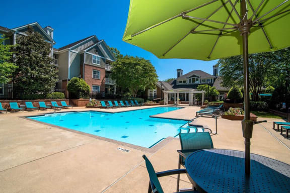 Two Sparkling Swimming Pools with Expansive Sundecks, Lounge Chairs, Umbrellas and Relaxing Courtyard at Autumn Park Apartments, Charlotte, NC 28262