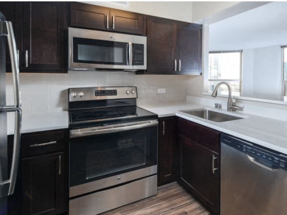 upgraded appliances in kitchen at Presidential Towers, Illinois, 60661