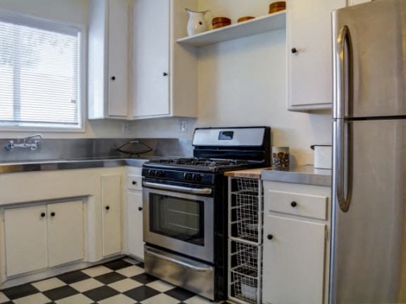 kitchen with vintage stainless steel appliances | Chase Knolls Garden Apartments Sherman Oaks CA