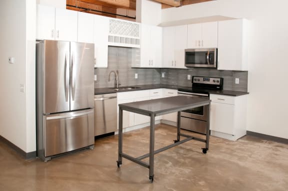 Fully Equipped Kitchen With Modern Appliances at 700 Central Apartments, Minneapolis, Minnesota