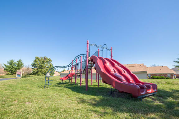 red playground in green space at Bradford Run in Kokomo, IN