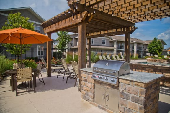 Outdoor Grilling Area at The Manor Homes of Eagle Glen, Raymore, Missouri
