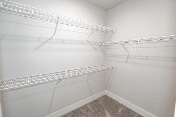 Empty white shelves in a room at McHenry Square Apartments, Augusta, Georgia