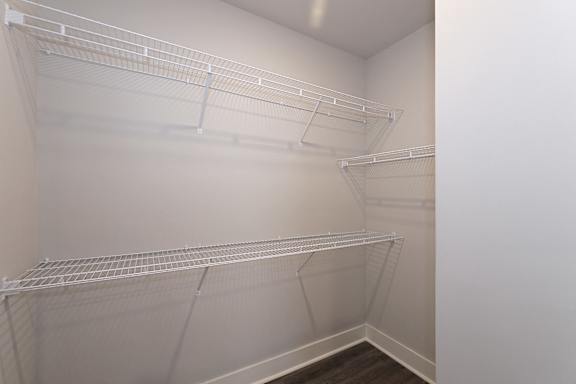 Empty white shelves in a room at McHenry Square Apartments, Augusta, GA, 30909