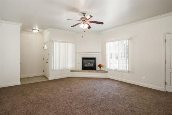 Living Room with Fireplace at Dartmouth Tower at Shaw, Clovis, CA