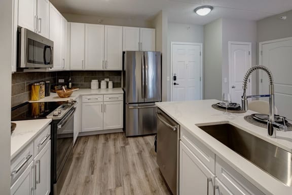 Kitchen With Ample Storage at The MilTon Luxury Apartments, Vernon Hills