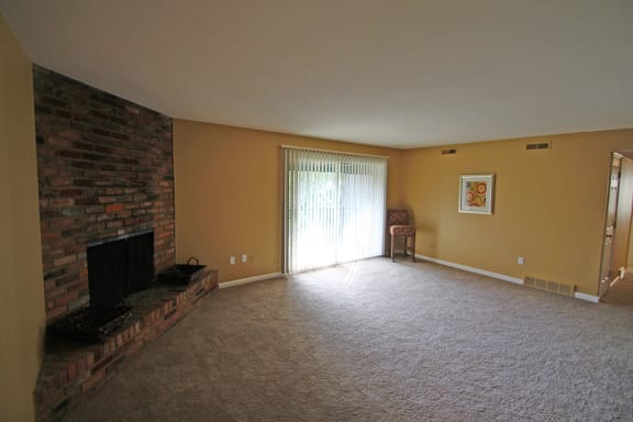 exposed brick wall in the living room  at Village East, Ohio, 45005