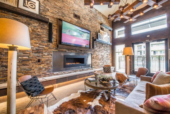 Clubroom With Smart Tv And Fireplace at Aviator West 7th, Fort Worth