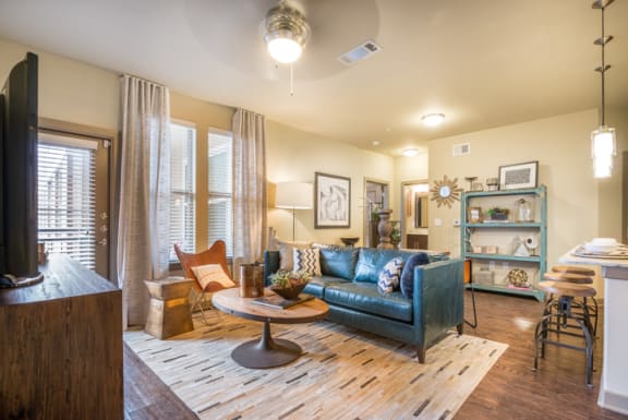 Contemporary Finishes Include Wood And Tile Flooring at Aviator West 7th, Fort Worth, 76107