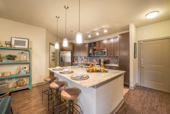 Fitted Kitchen With Island Dining at Aviator West 7th, Fort Worth, 76107