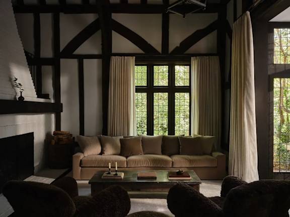 a living room with a couch and a coffee table