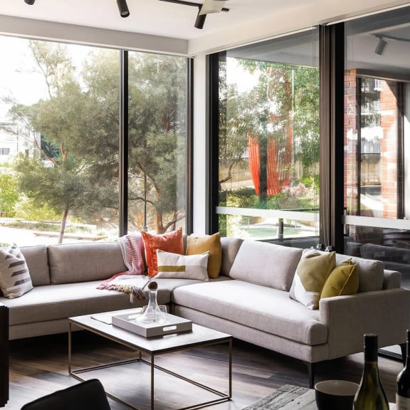 a living room with a couch and a table