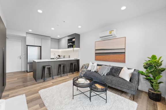 a living room with a couch and a table
