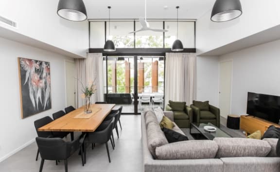 a living room with a couch and a tv