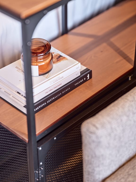 a table with a stack of books on top of it