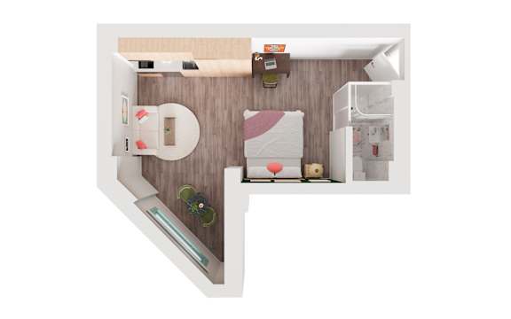 A white and wood bathroom with a toilet, sink, and a bed.